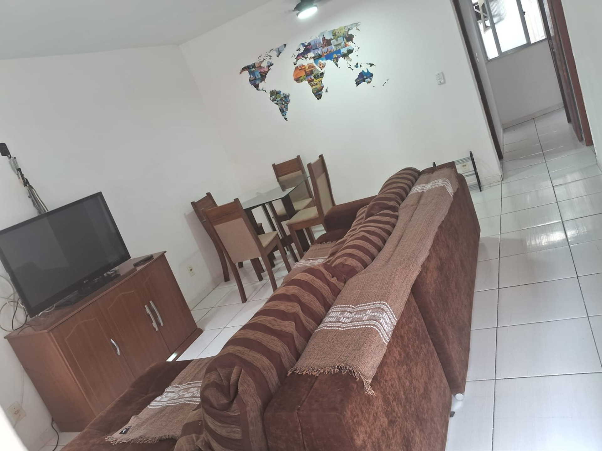 Living and dining area with sofa