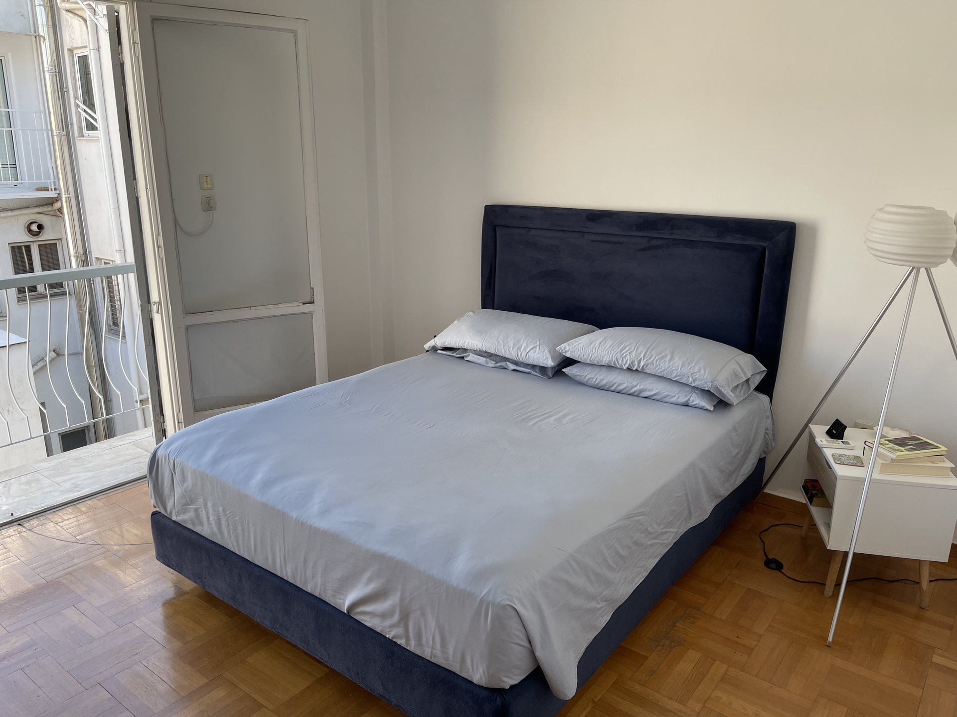 Bedroom with double bed balcony