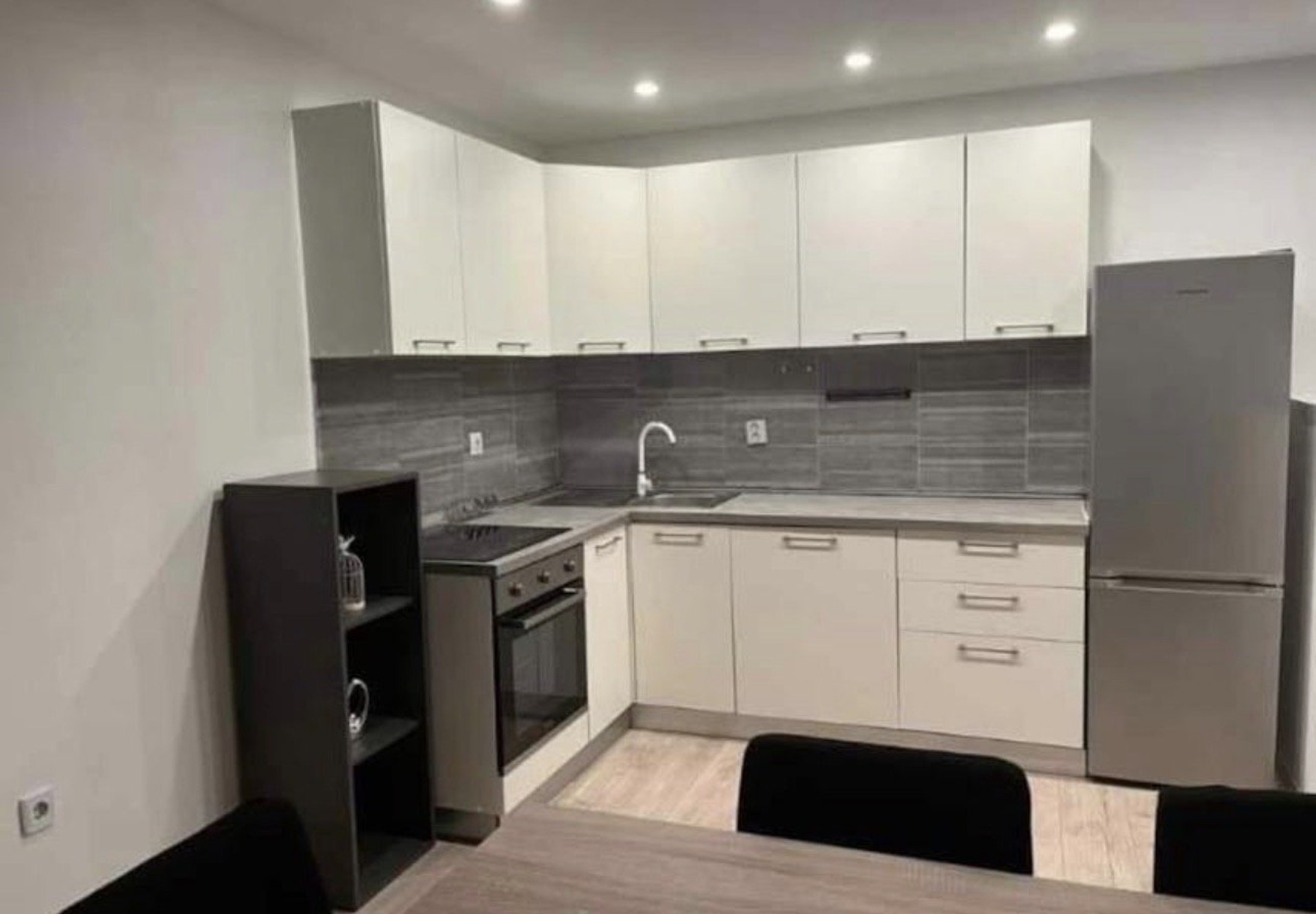Kitchen with white cabinetry