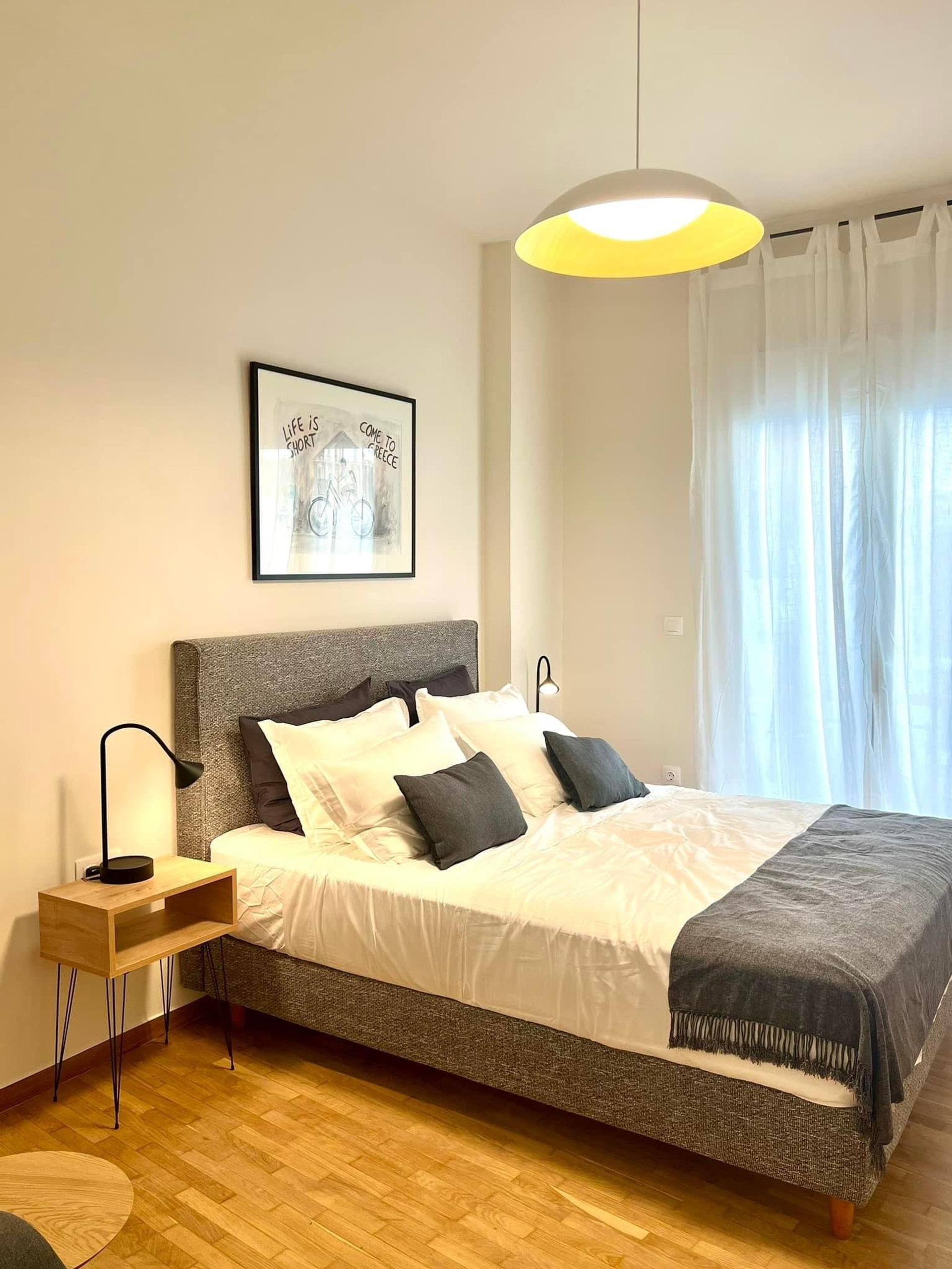 Bedroom with bed and nightstand