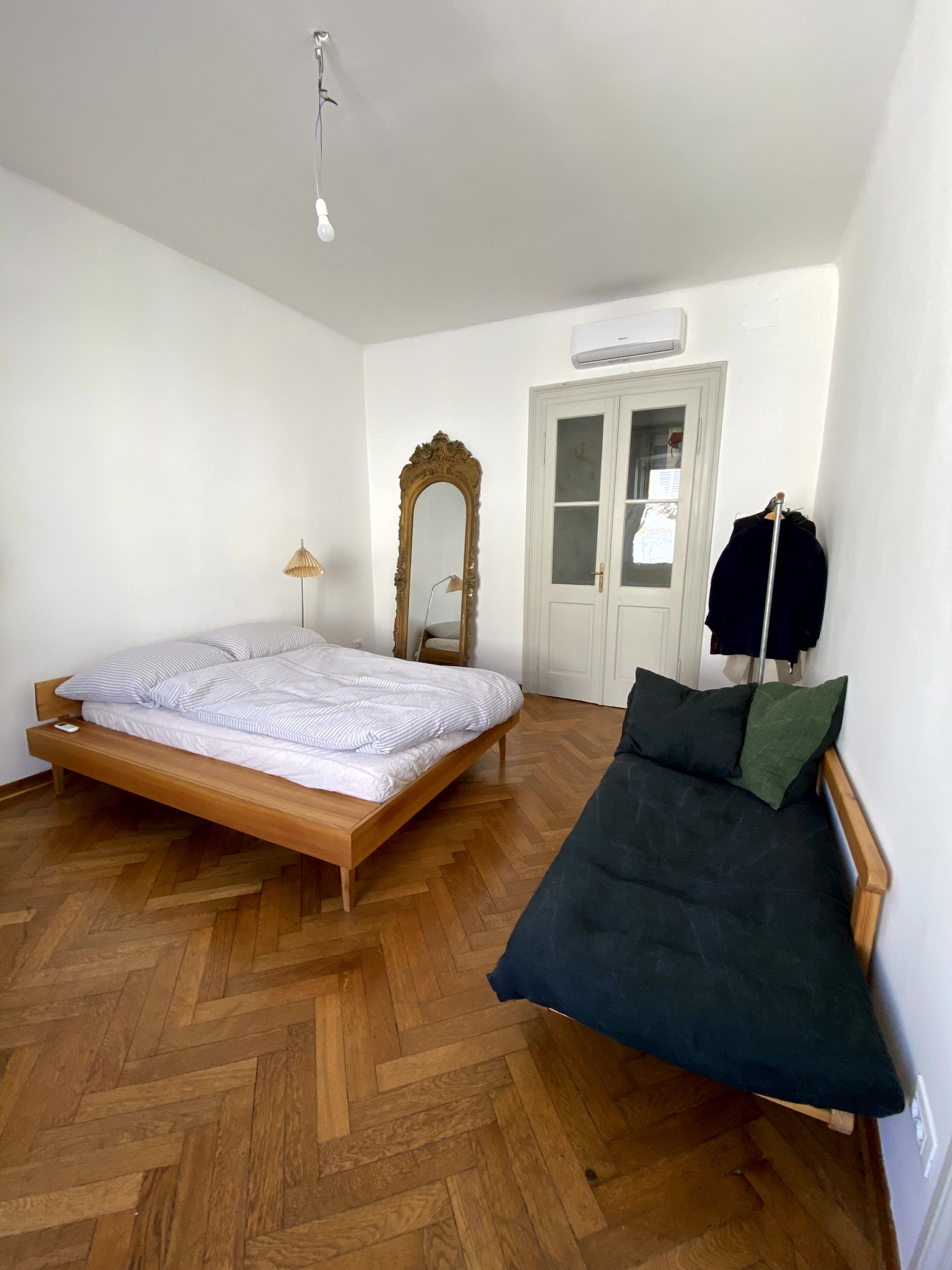 Bedroom with bed and daybed