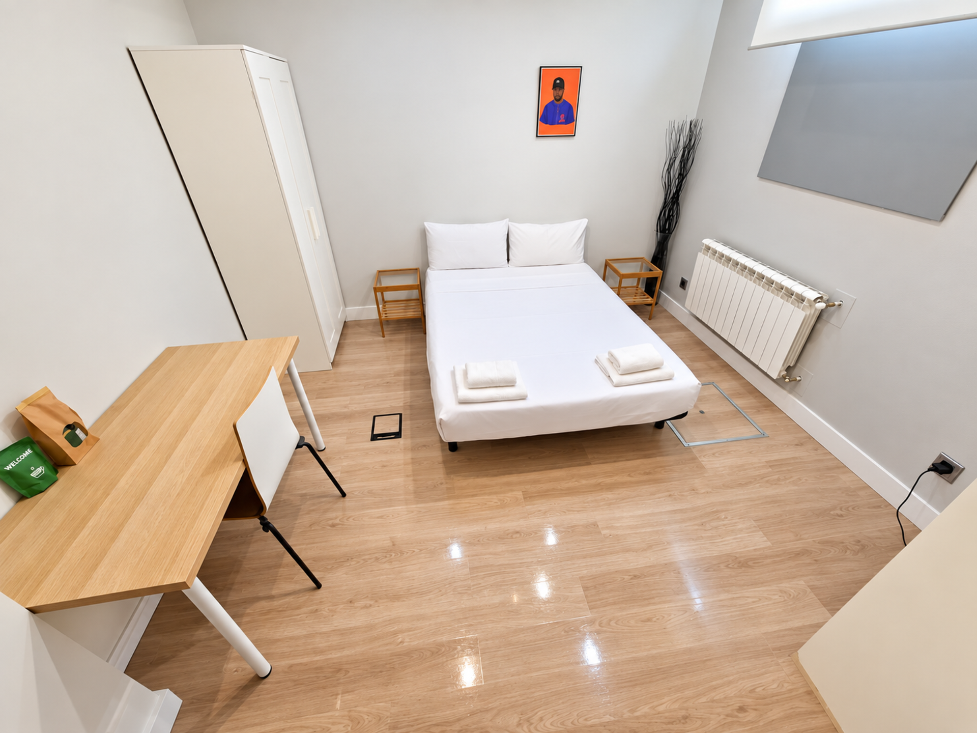 Bedroom with desk and wardrobe