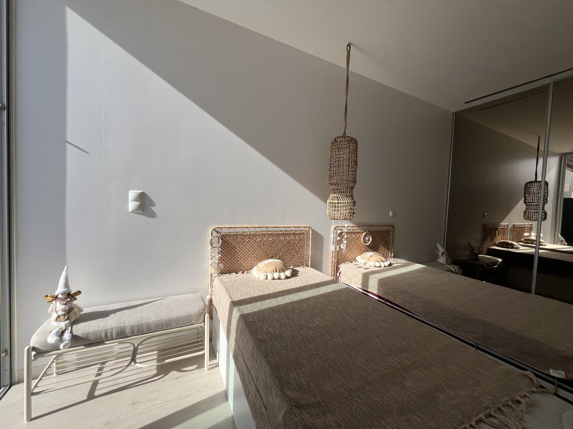Twin bedroom with natural light