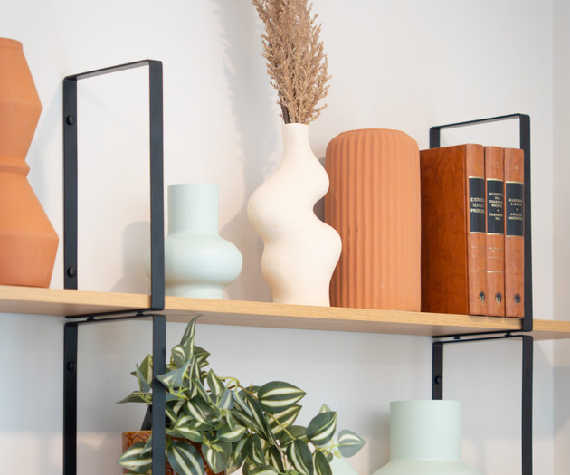 Shelf with decorative vases