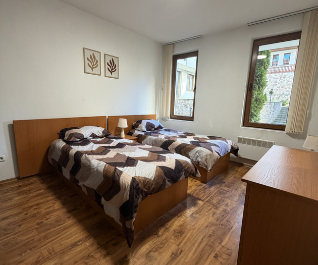 Twin bedroom with desk