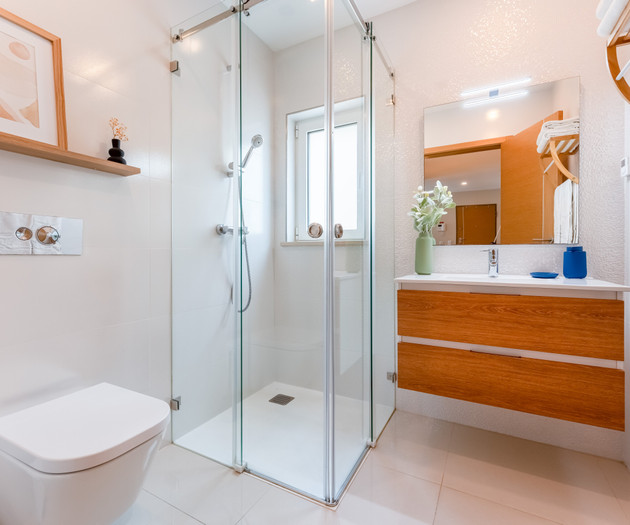 Bathroom with shower and vanity
