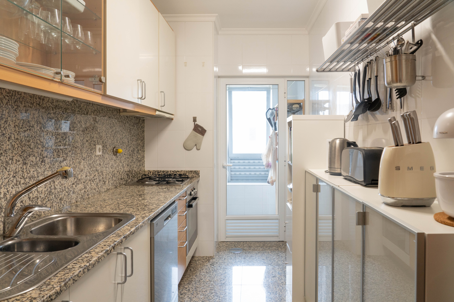 Galley kitchen with appliances