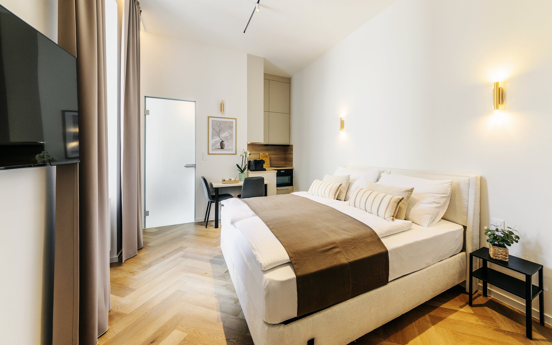 Bright studio bedroom with kitchenette
