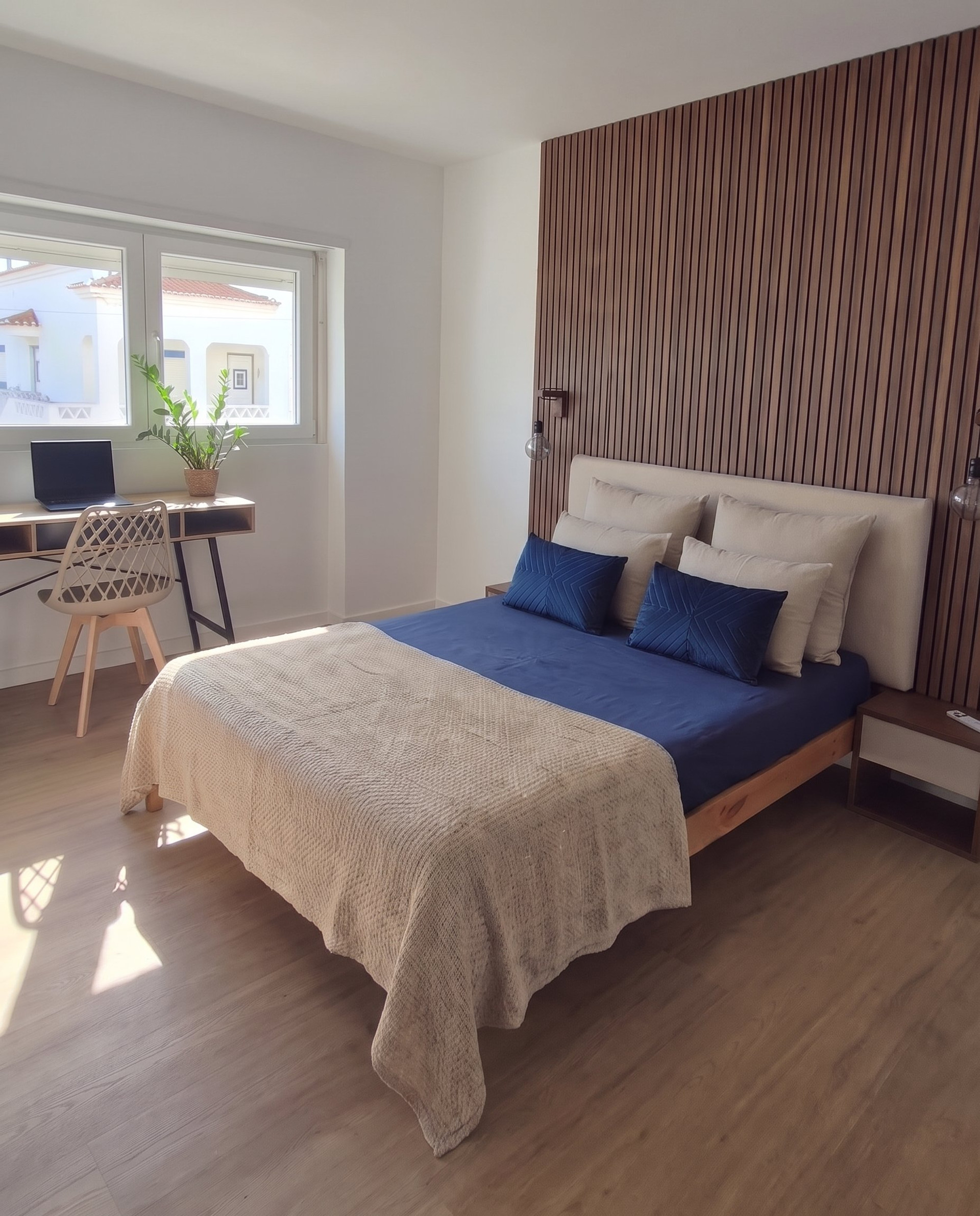 Bedroom with wood accent wall