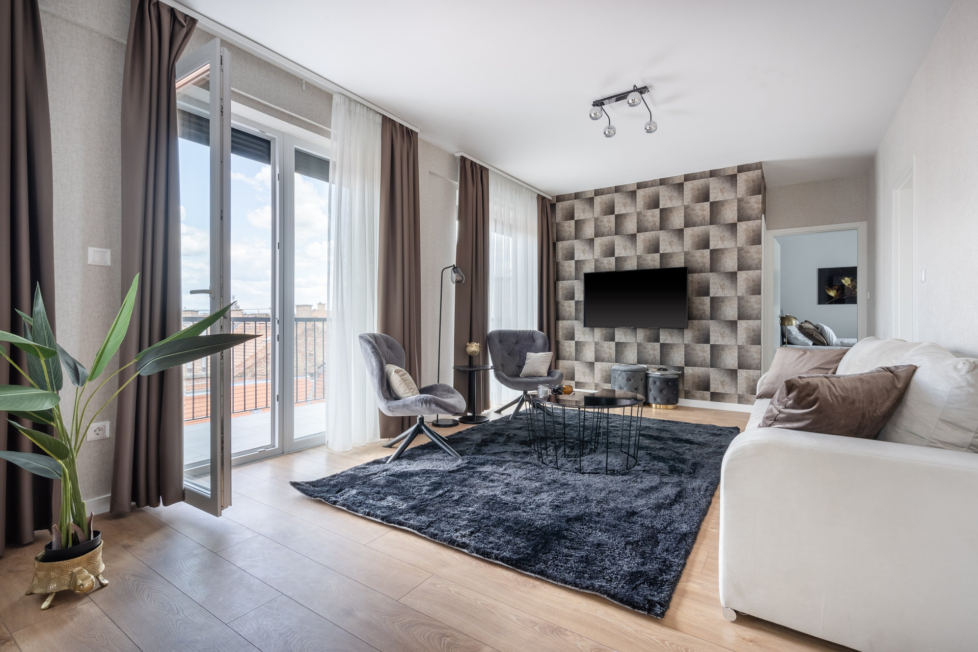 Stylish living room with balcony access