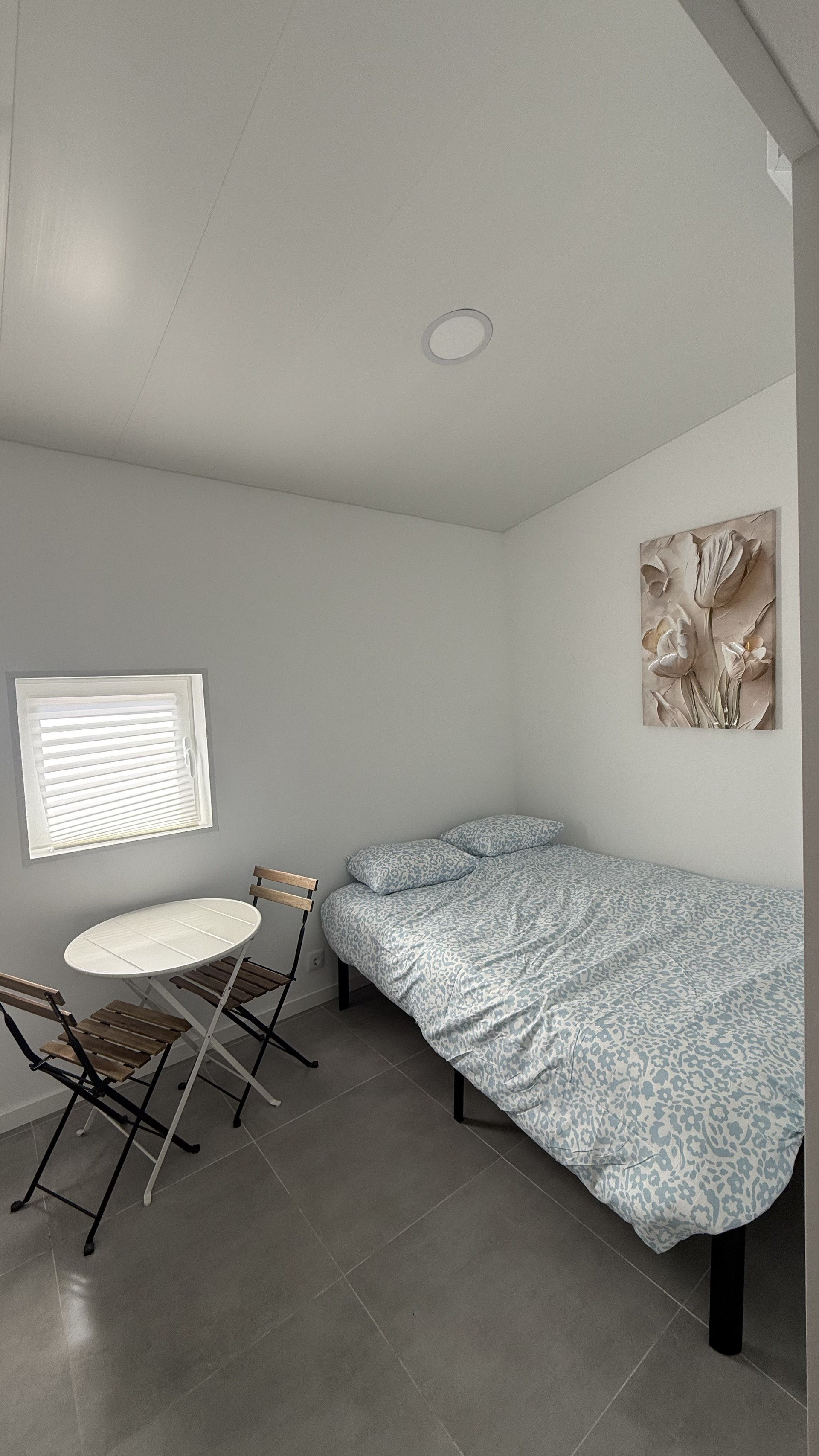 Bedroom with bed and table