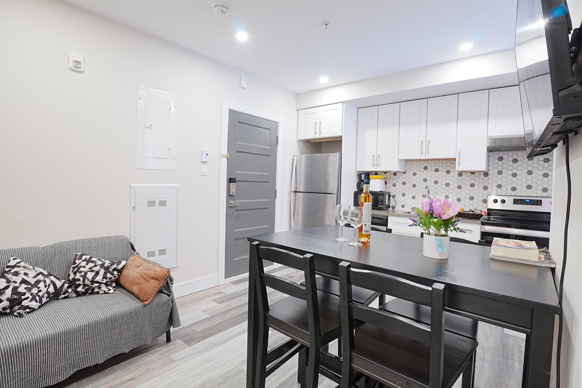 Living room open to modern kitchen