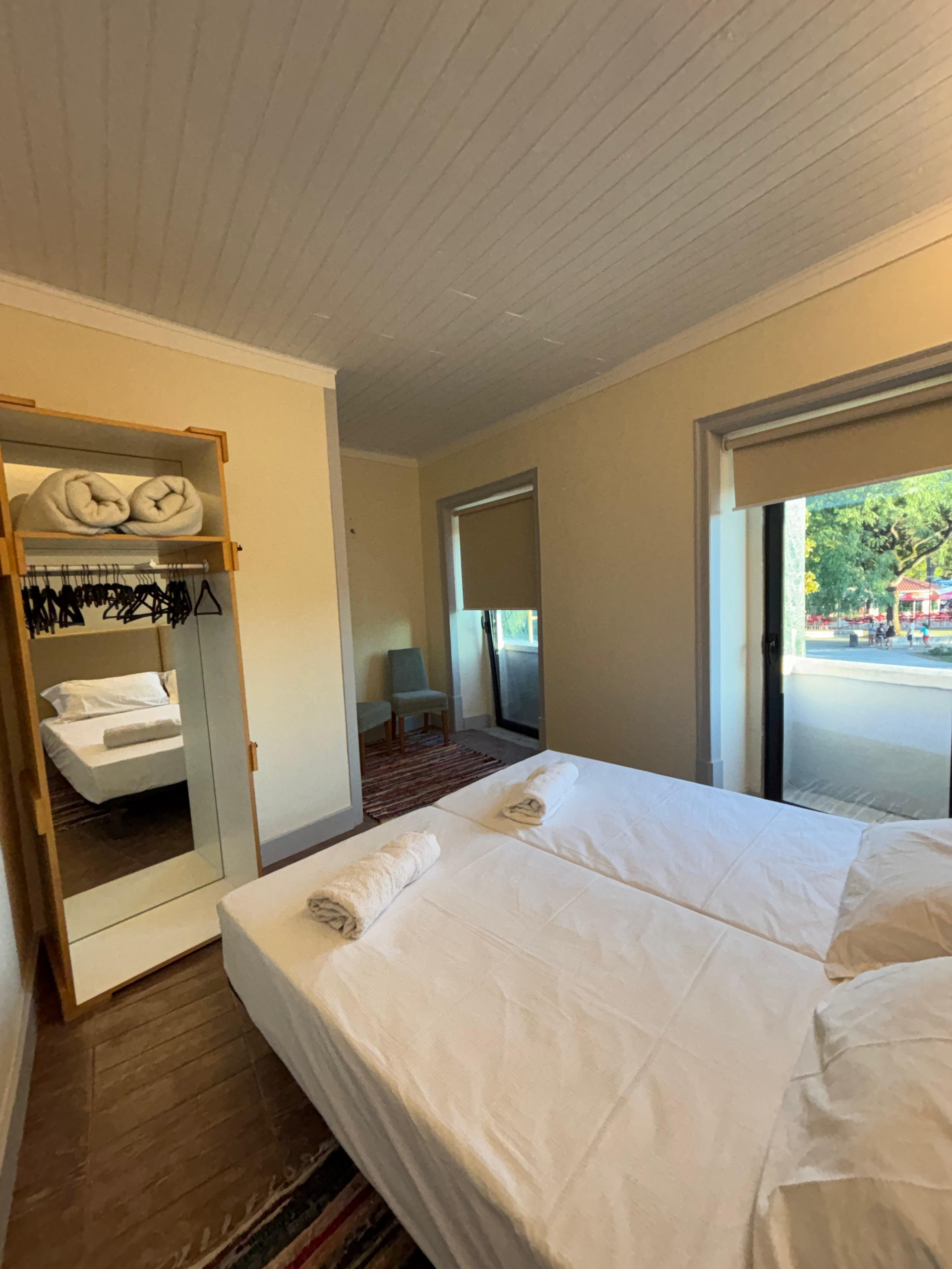 Bedroom with wardrobe and balcony