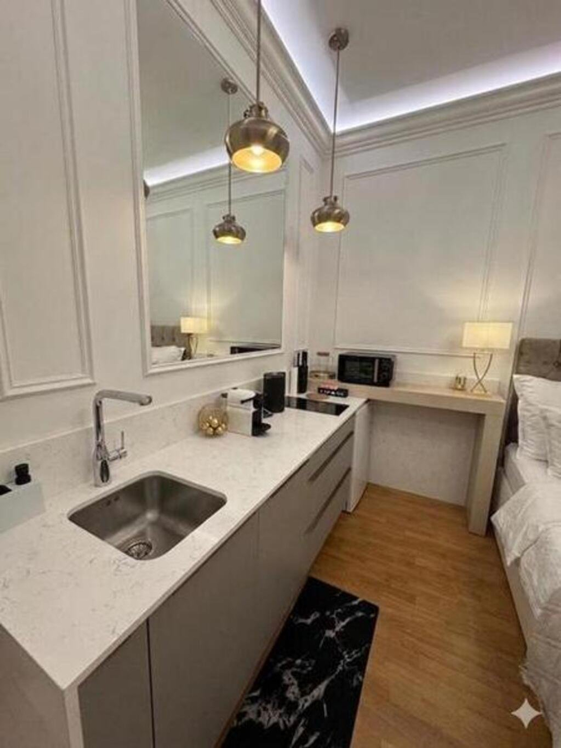 Kitchenette with marble countertop