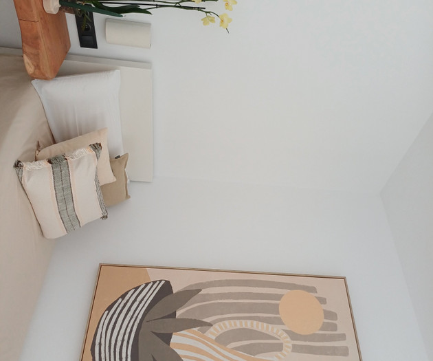 Bedroom nightstand and artwork
