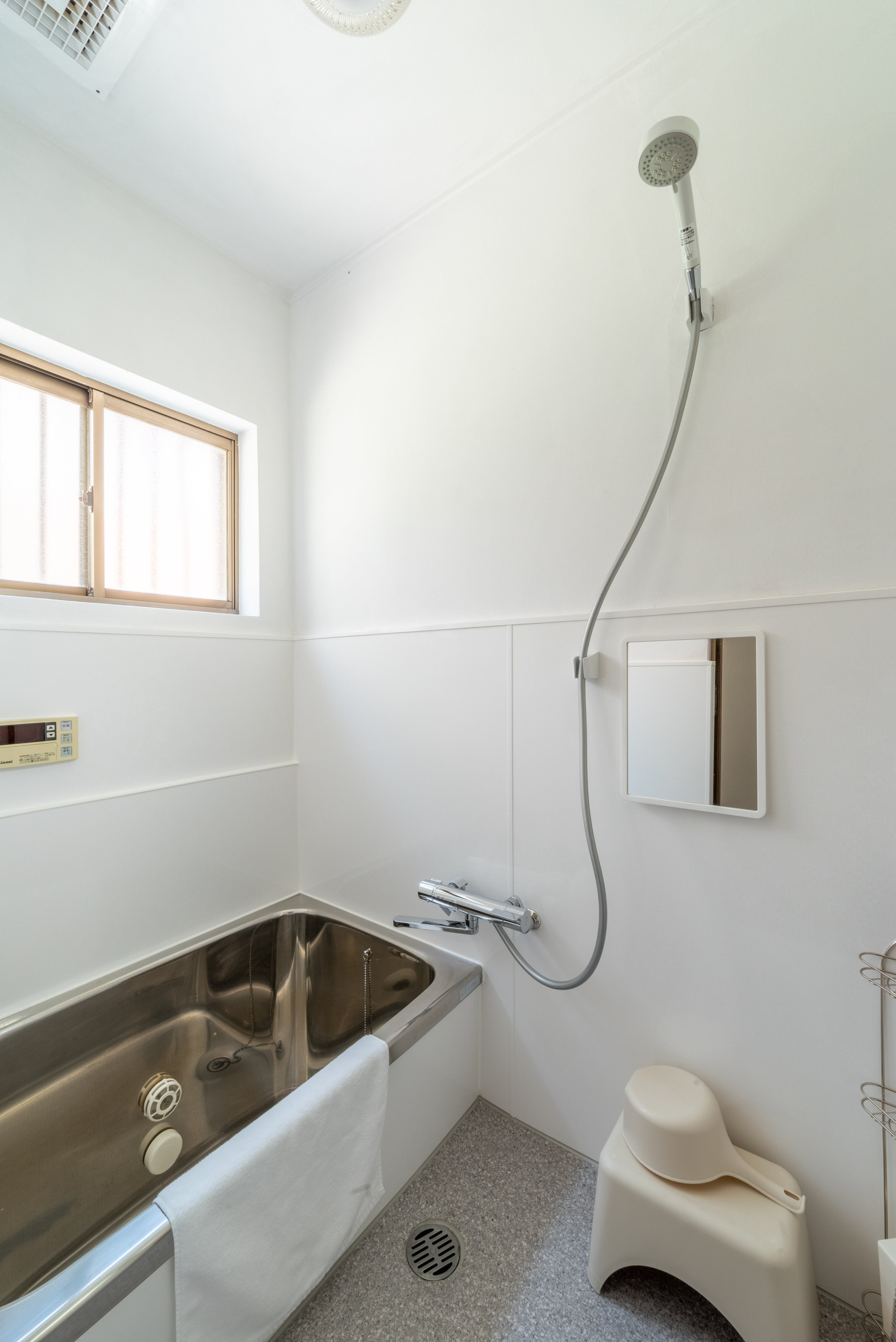 Bathroom with tub and shower