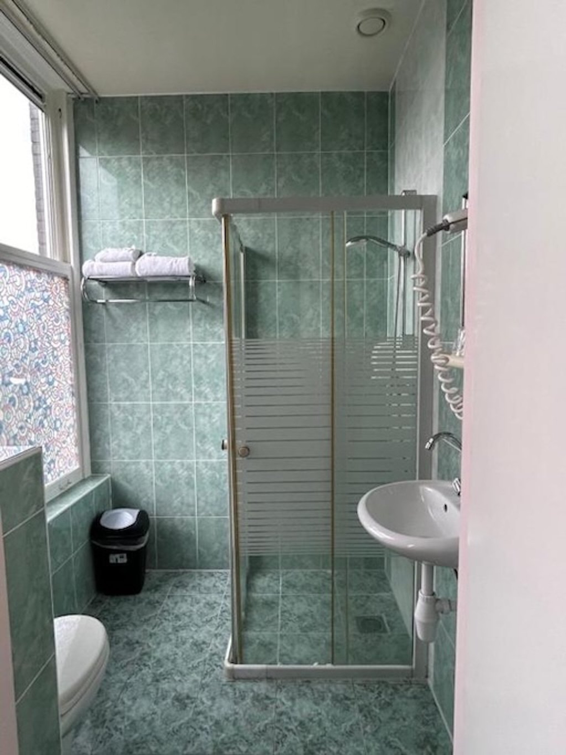 Bathroom with glass shower cabin