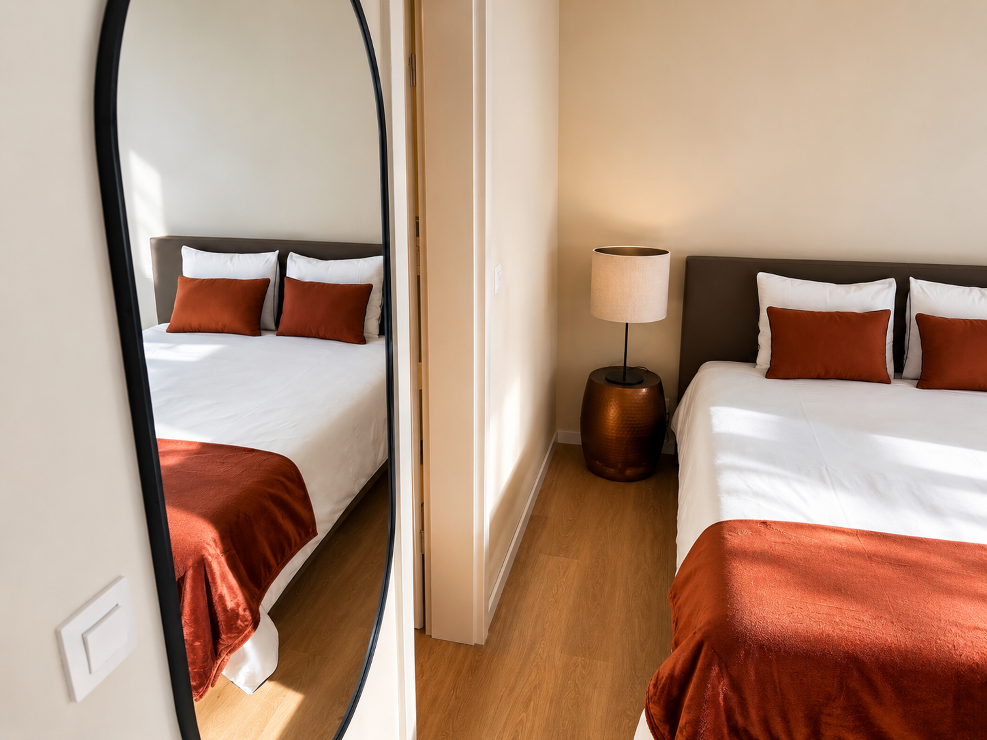 Bedroom with mirror and lamp