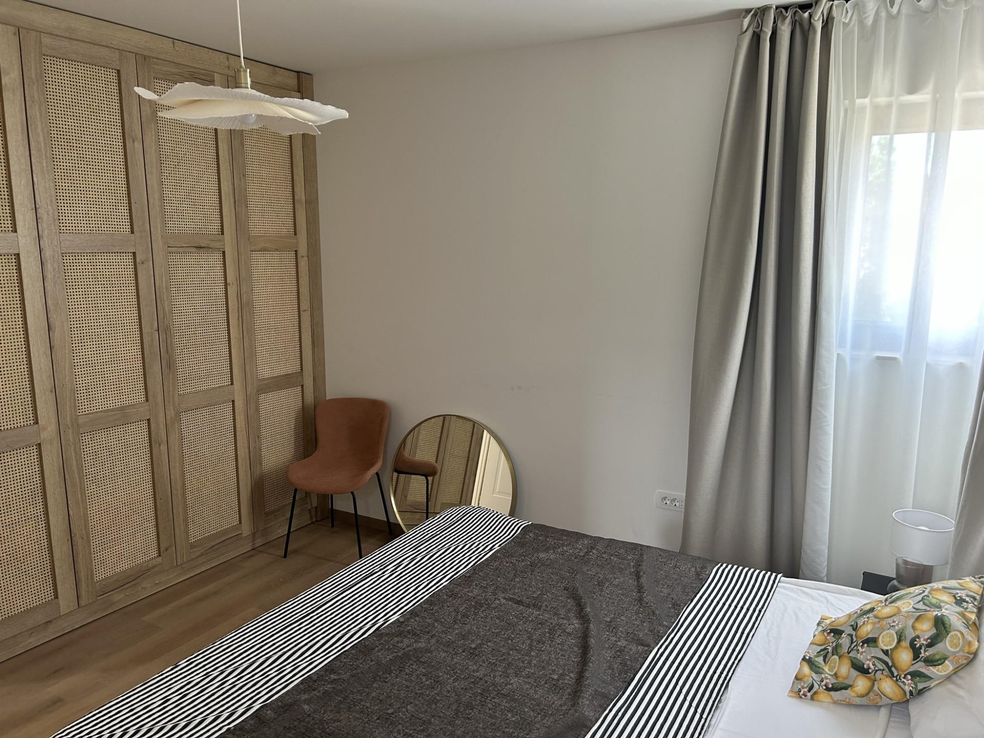 Bedroom with rattan wardrobe