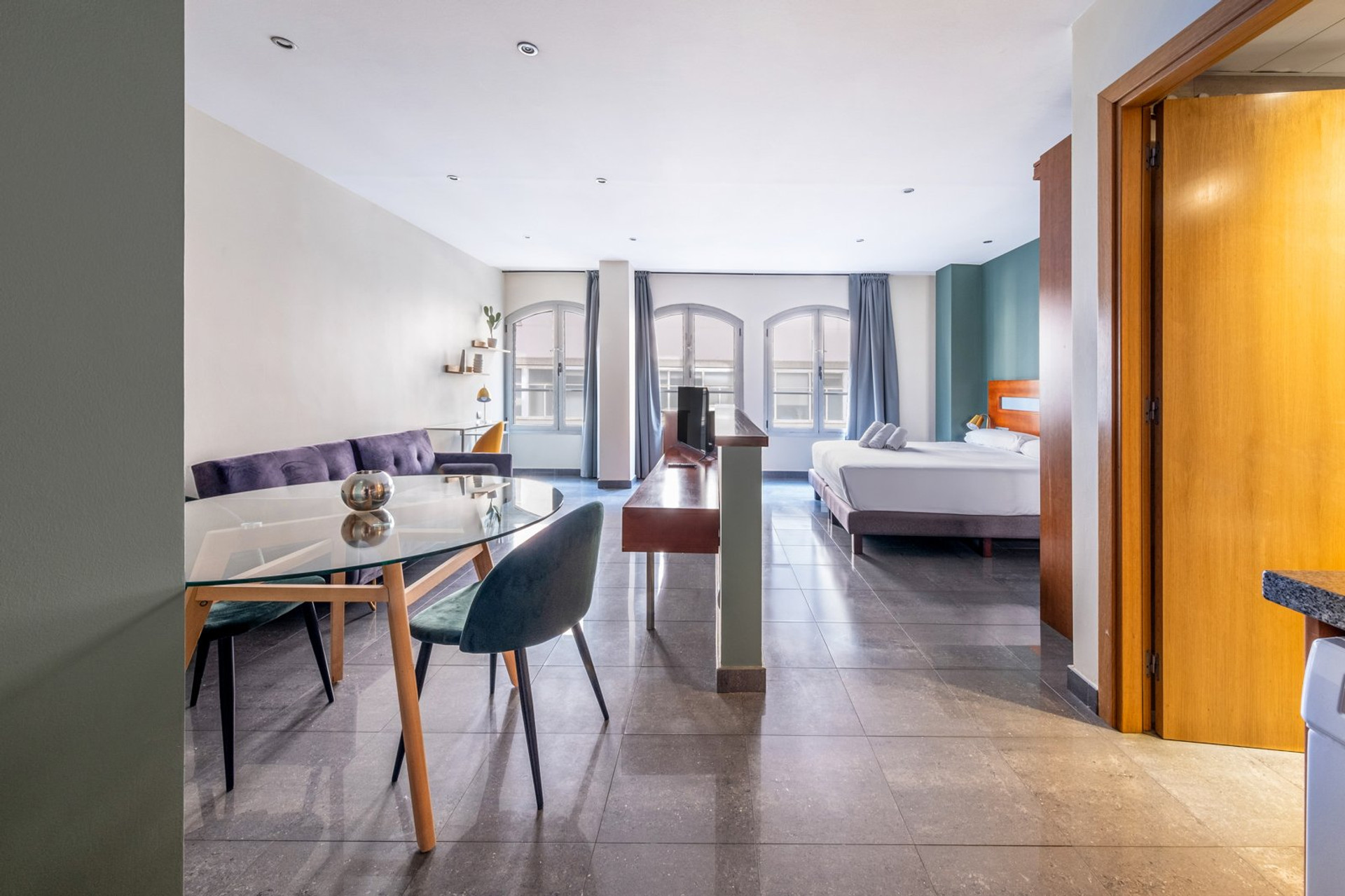 Dining area and bedroom open plan