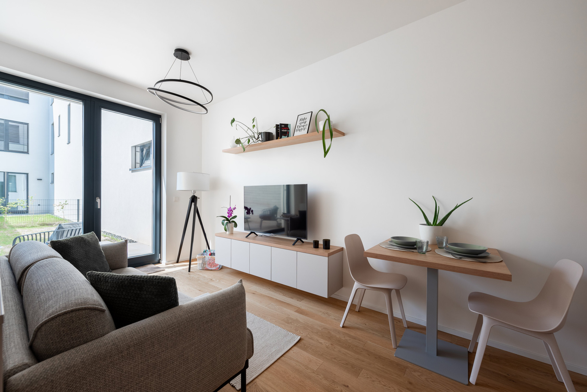Living room with TV and dining