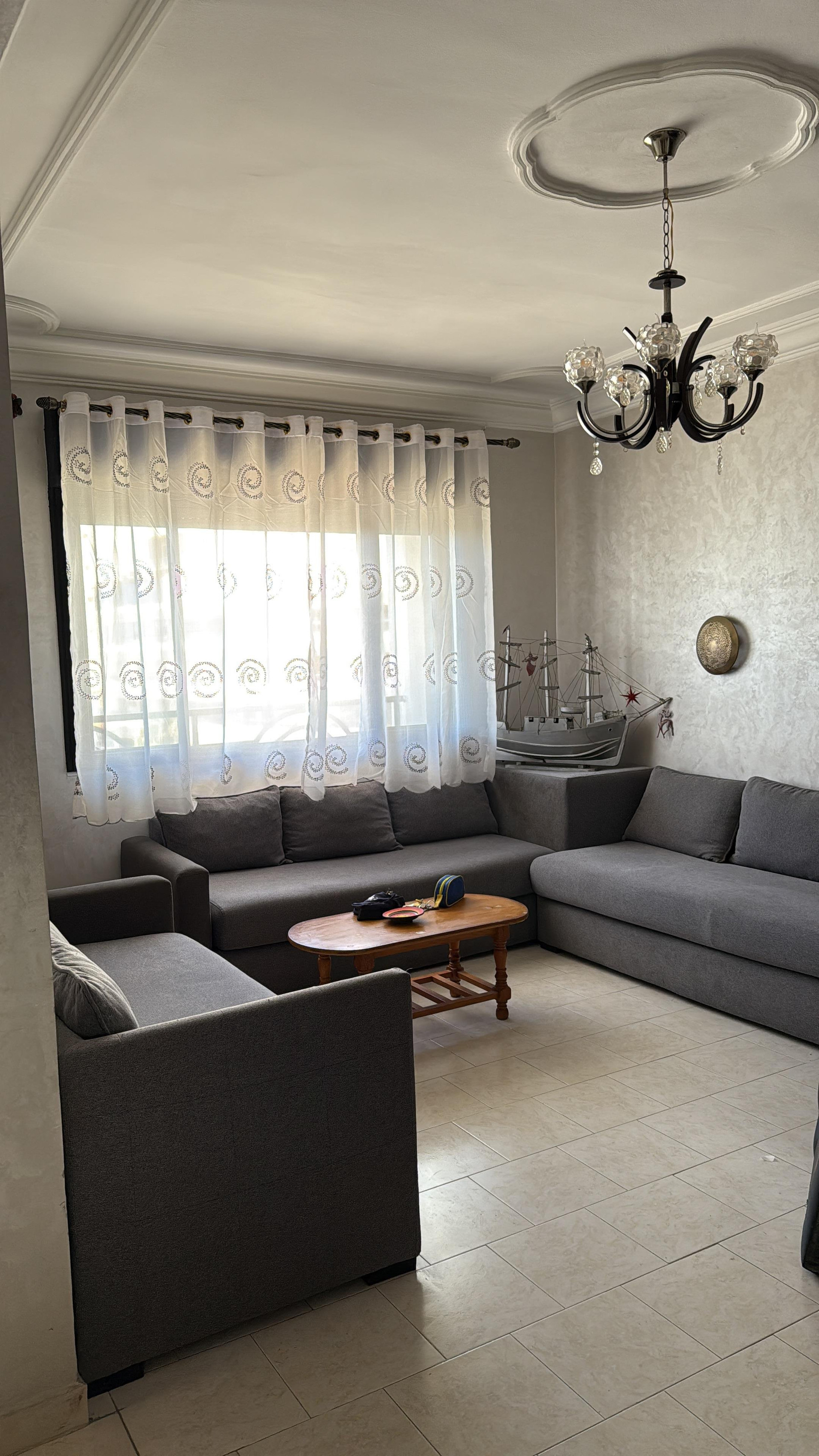 Spacious living room with chandelier