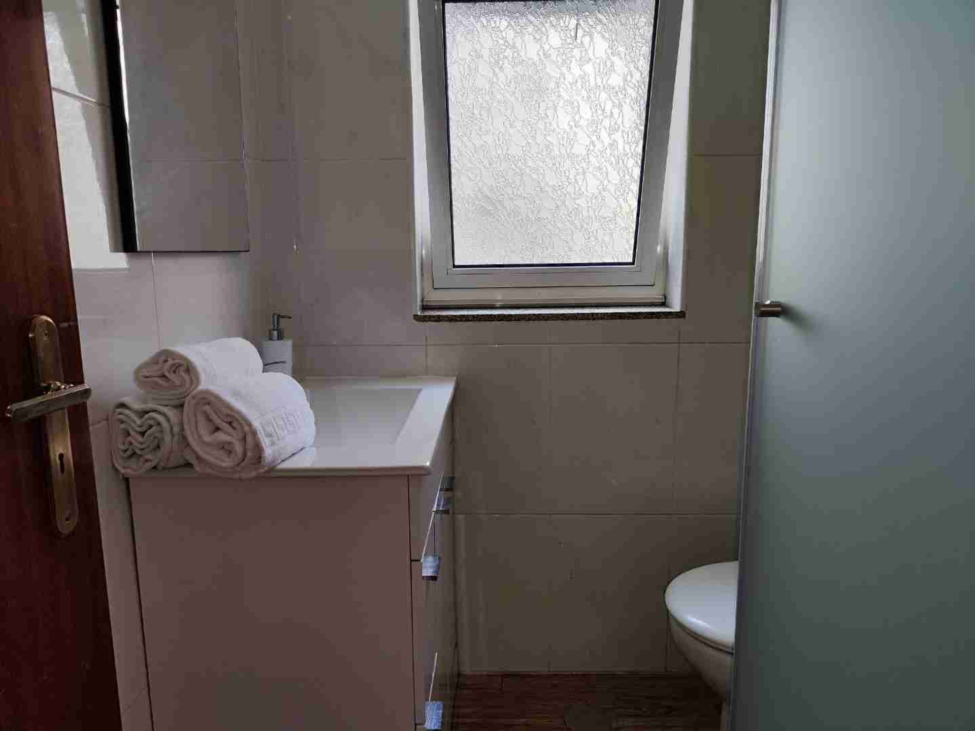 Bathroom with sink and toilet