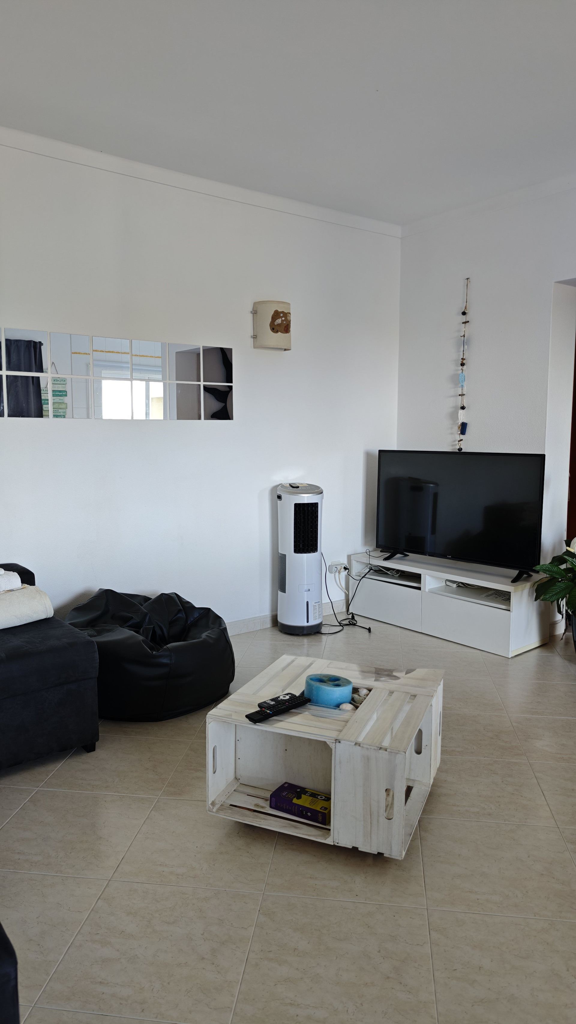 Living room with TV and seating