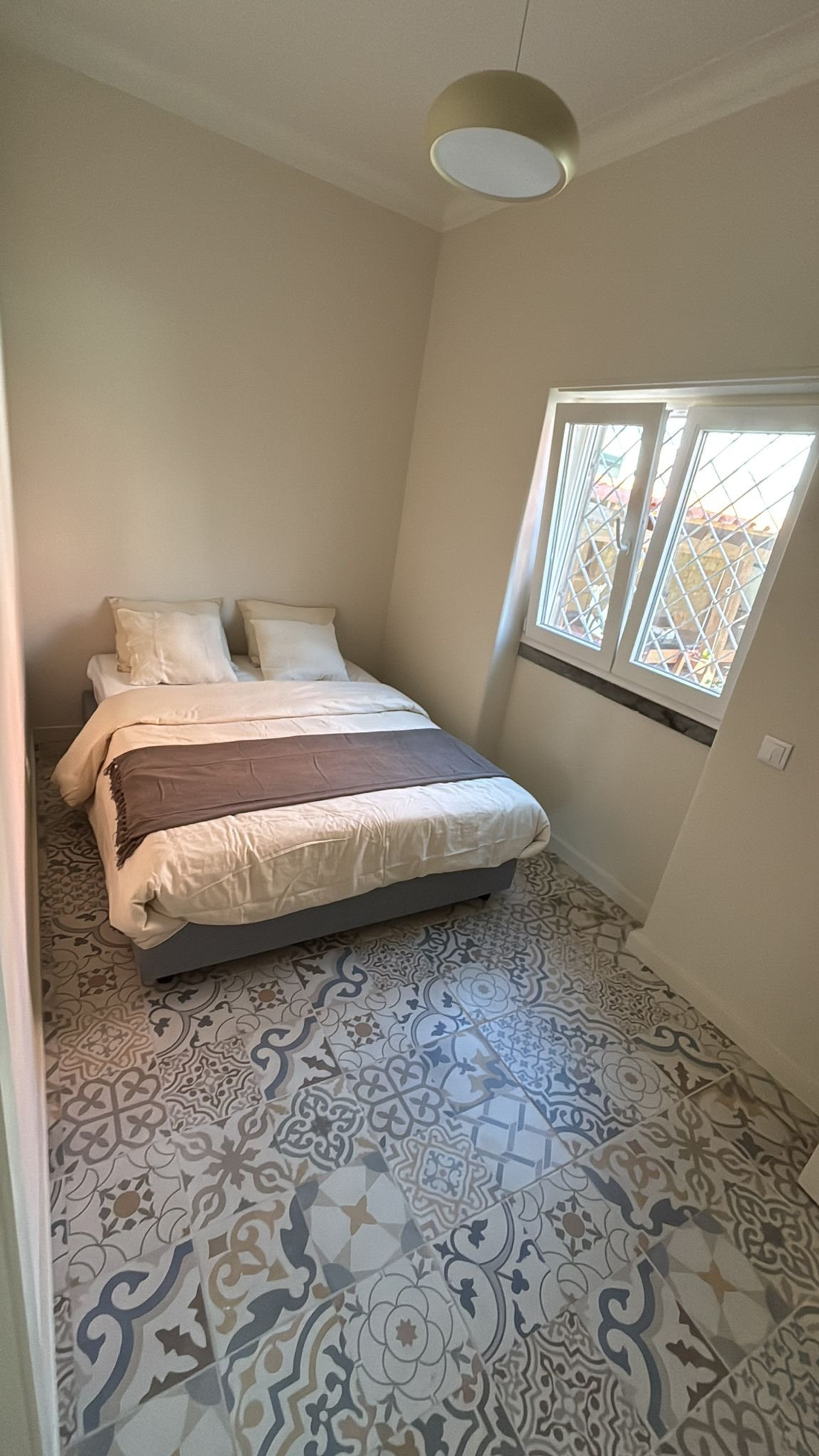 Cozy bedroom with double bed