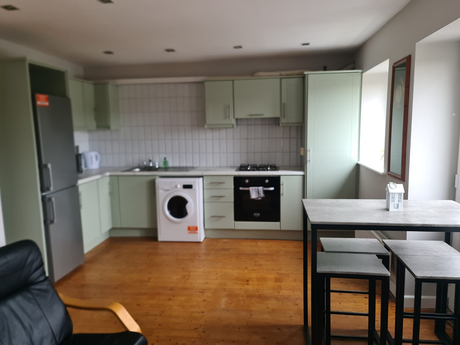 Open plan kitchen dining living area
