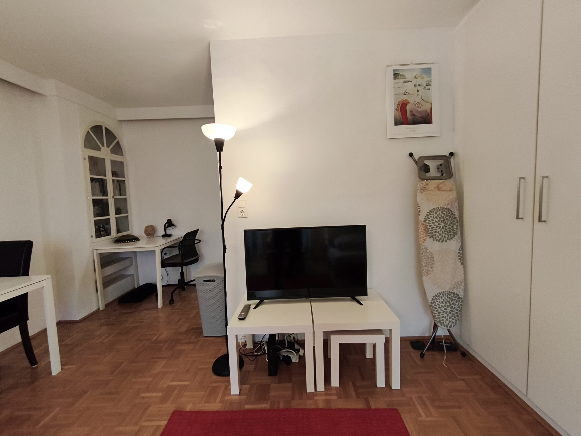 Living area with TV and desk