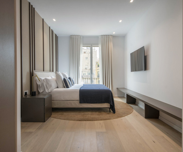 Bedroom with striped wall