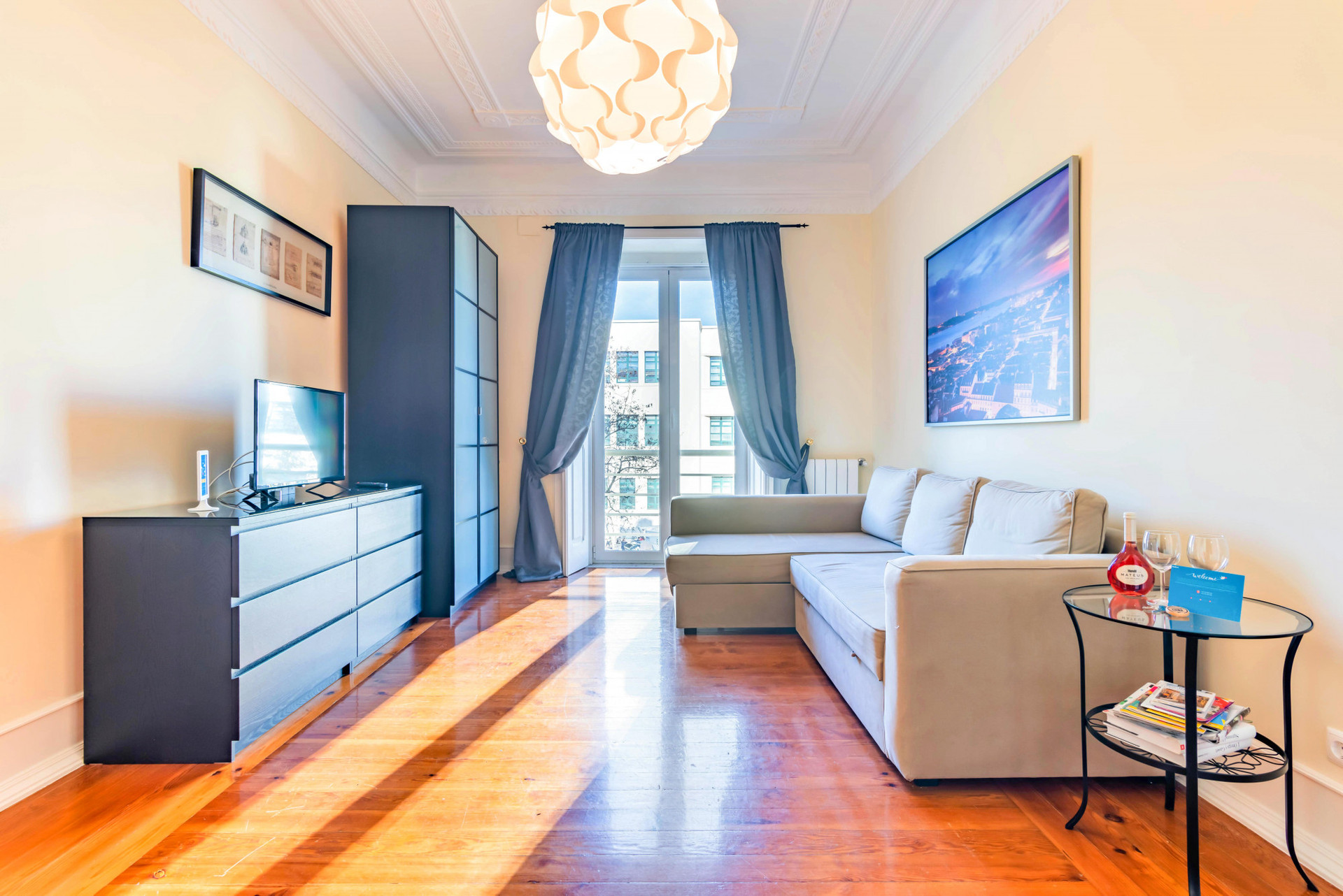 Living Room with Balcony and Smart TV