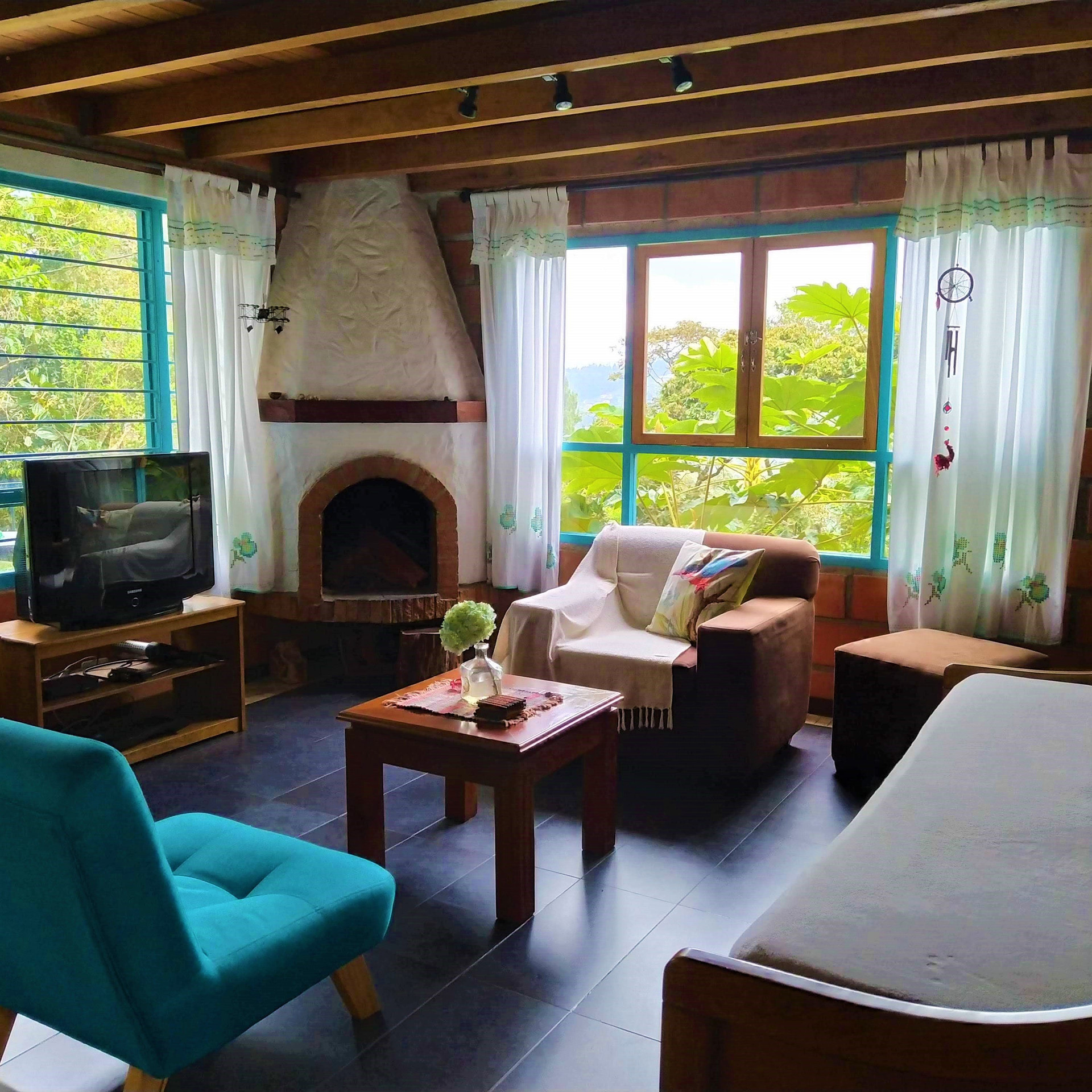 Living room fireplace and armchair