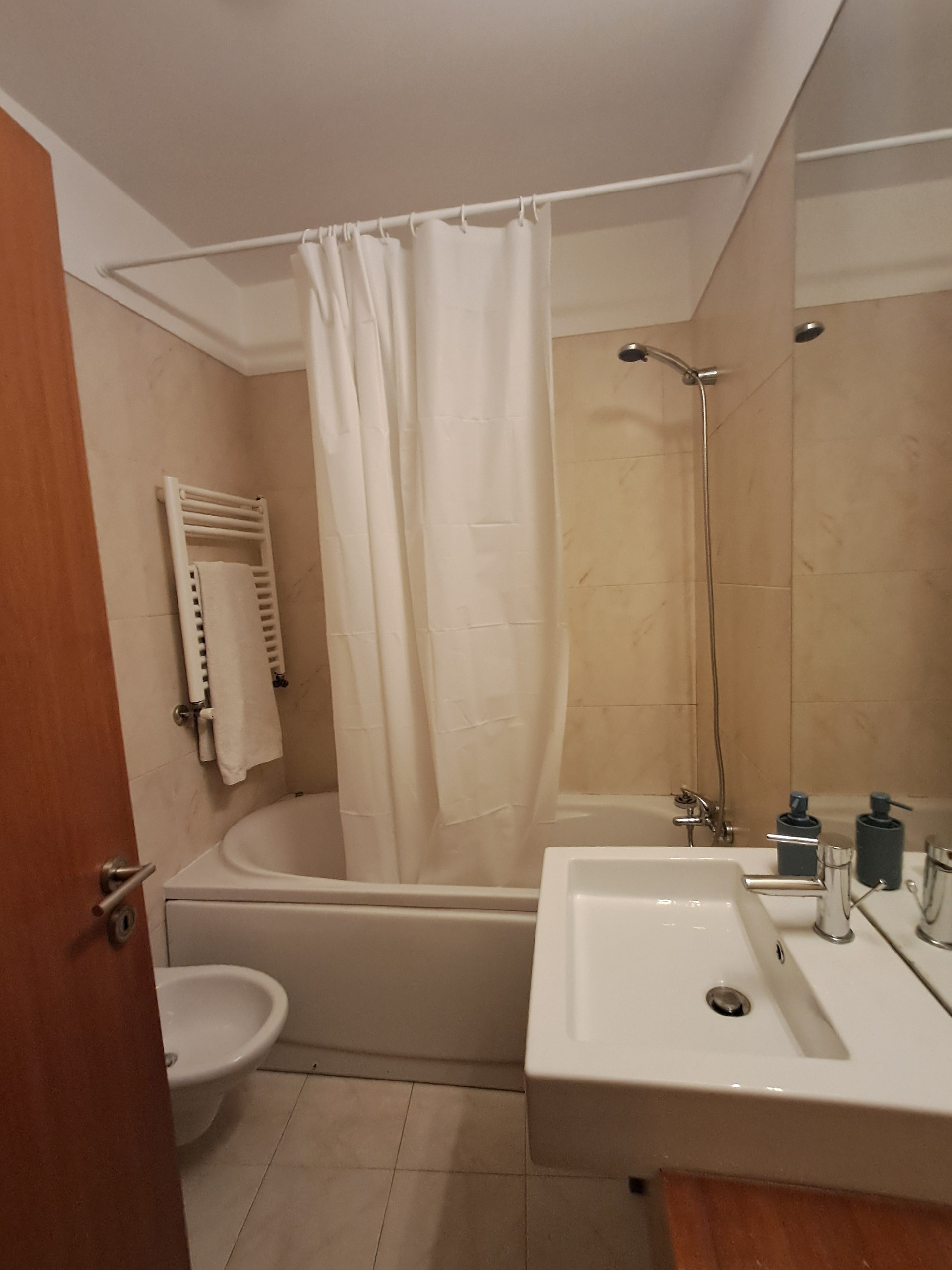 Bathroom with tub and shower