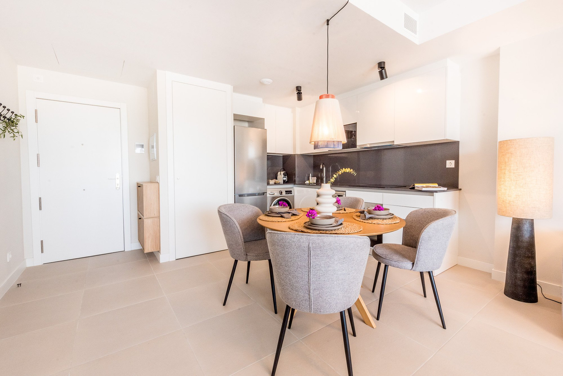 Dining table, entrance and kitchen