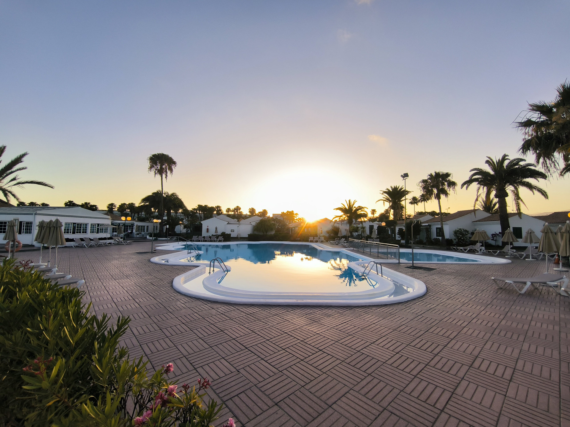 Community pool at sunset