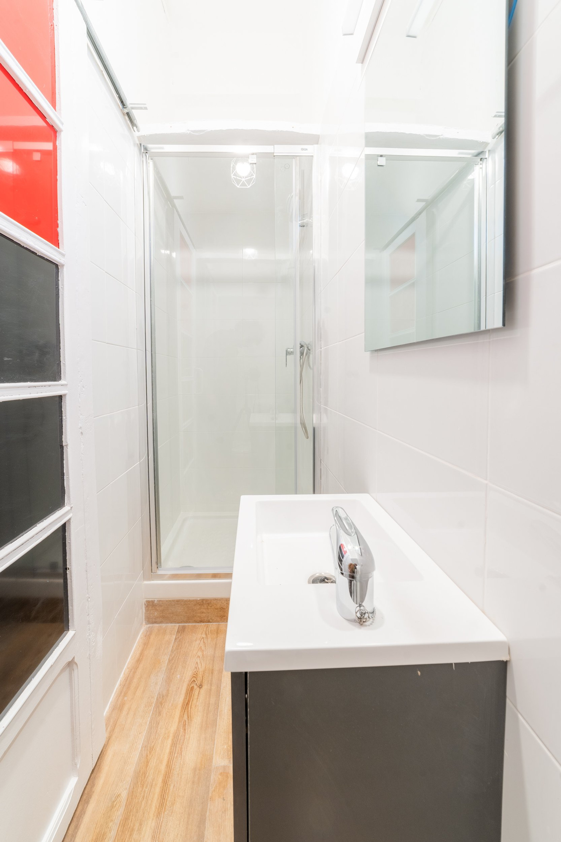 Bathroom with shower and vanity