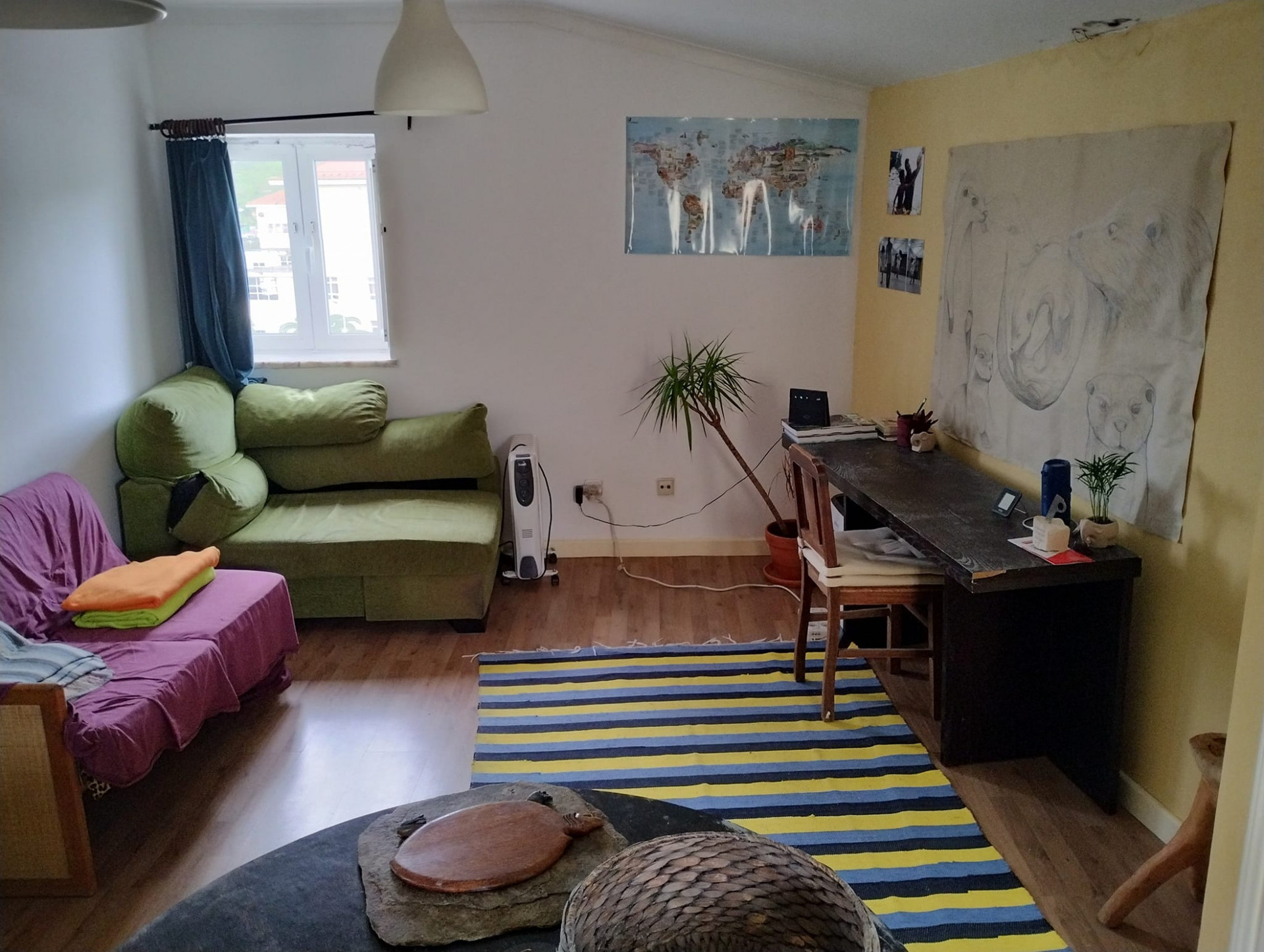 Living room (the green sofa has now been substituted by a bigger sofa bed)