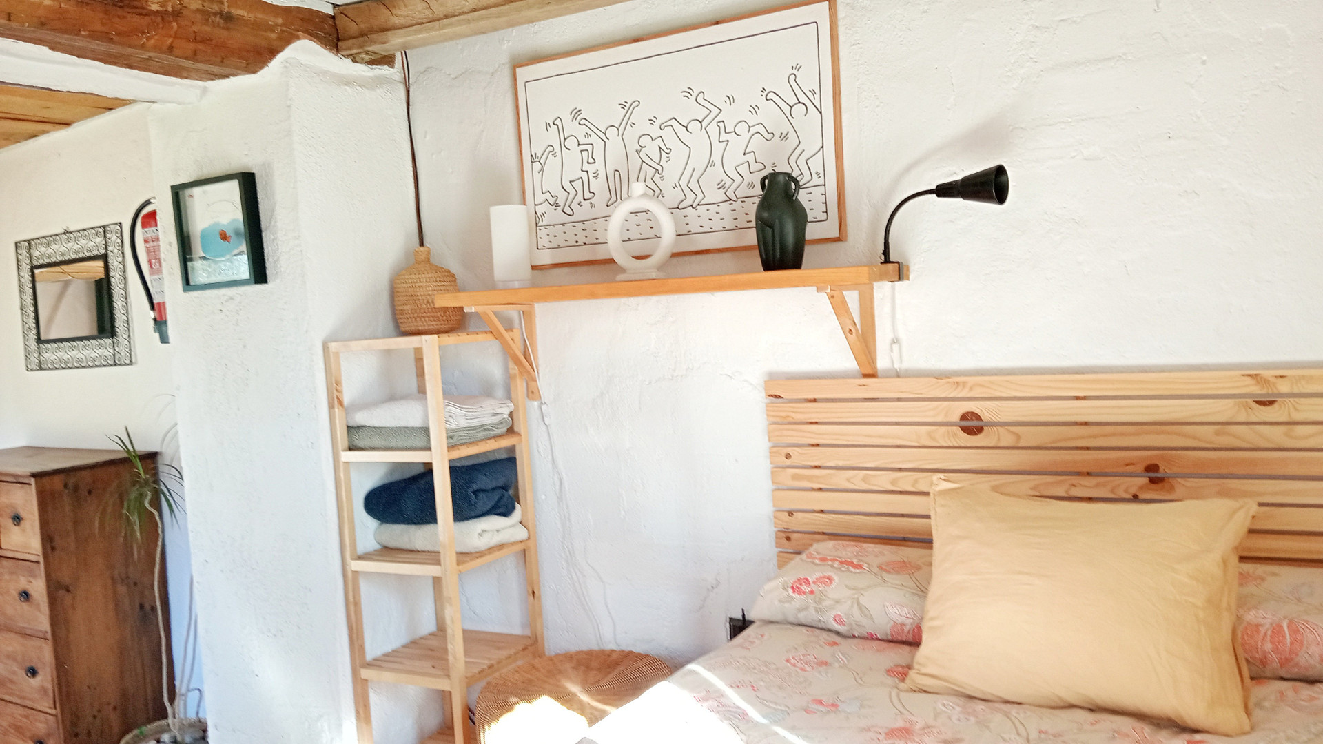 Bedroom detail with wooden headboard
