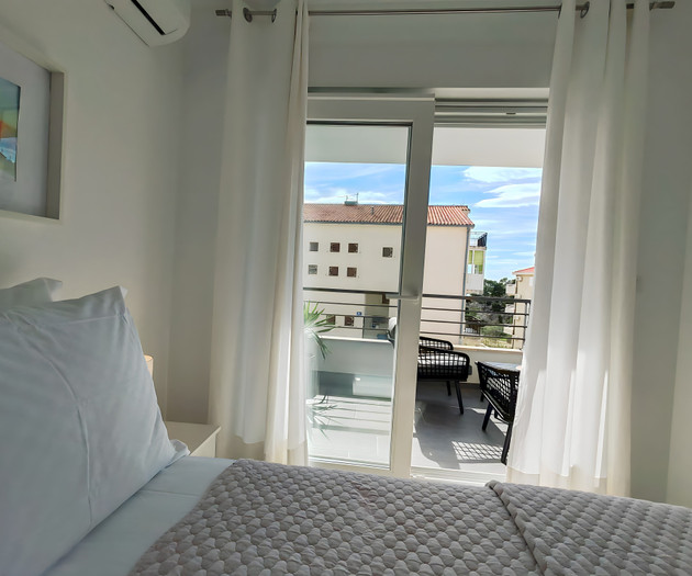 Bedroom with balcony door view