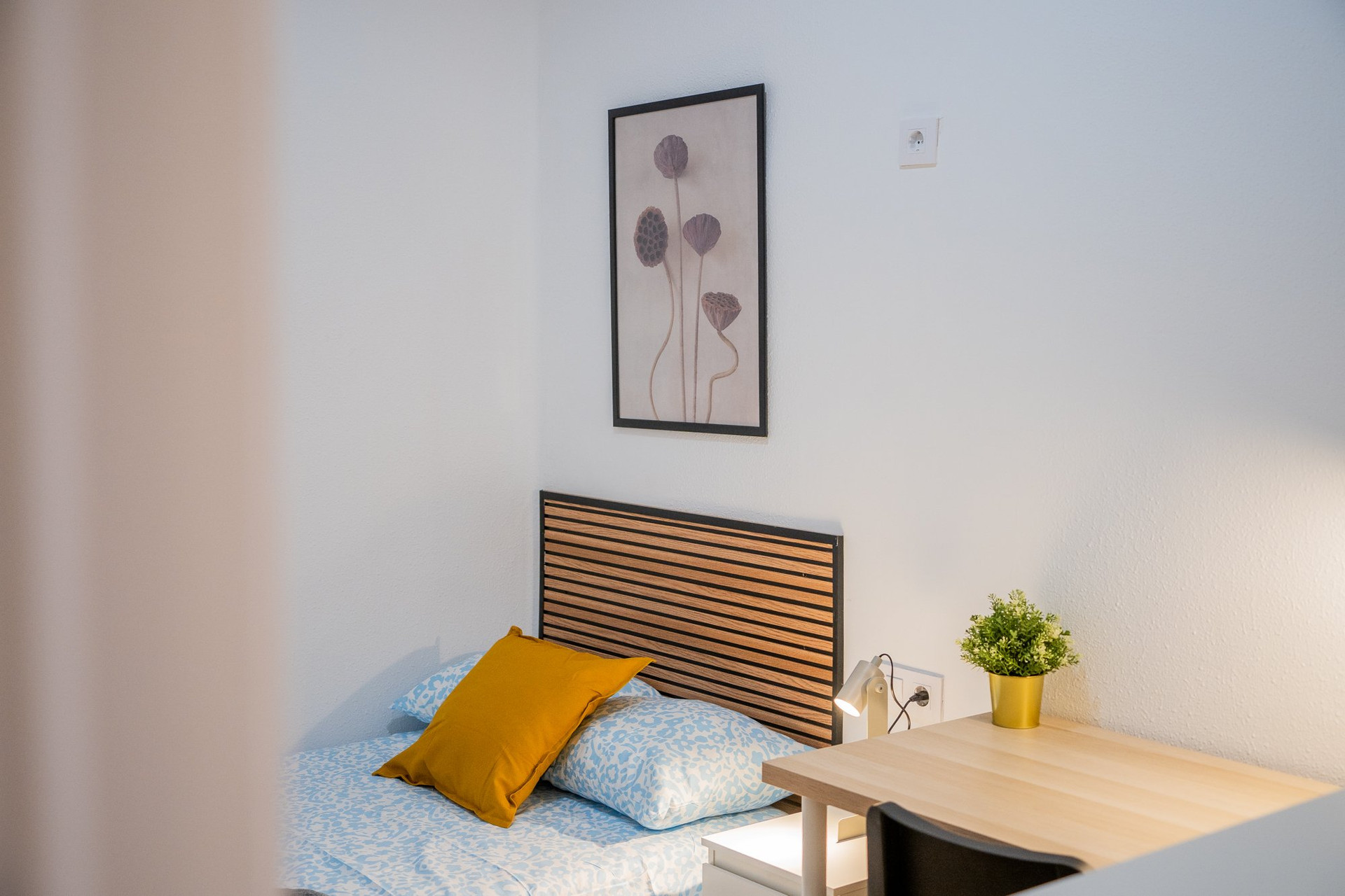 Bedroom with single bed and desk