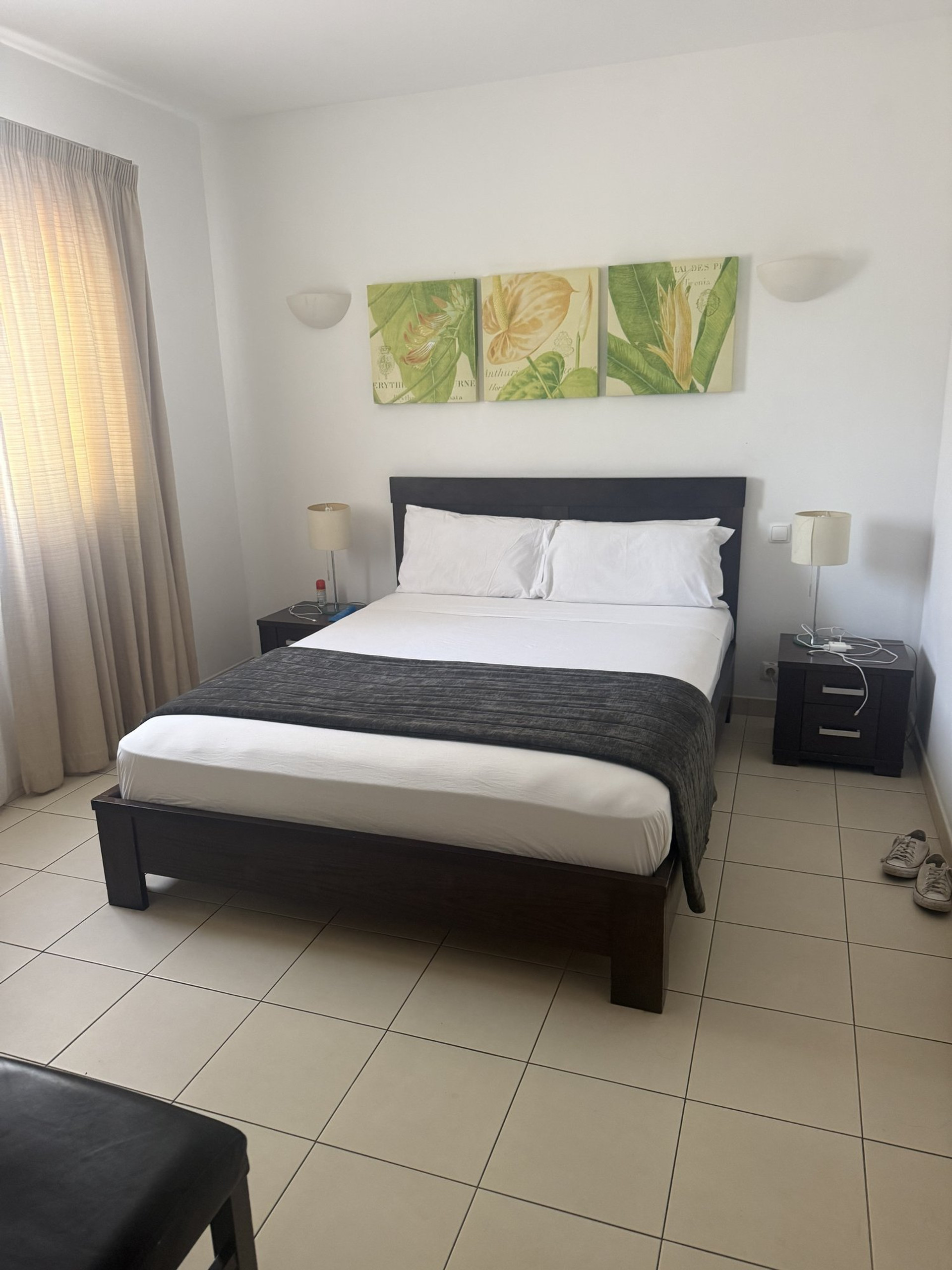 Bright master bedroom with double bed