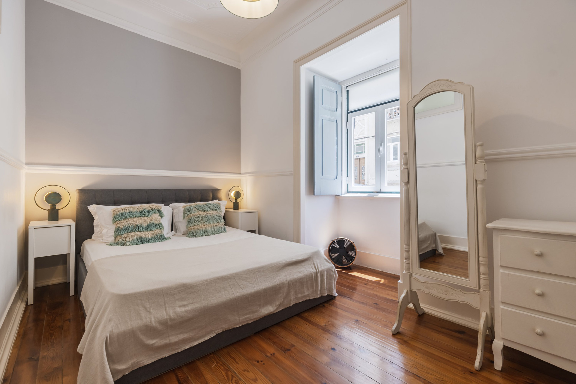 Master bedroom with mirror dresser