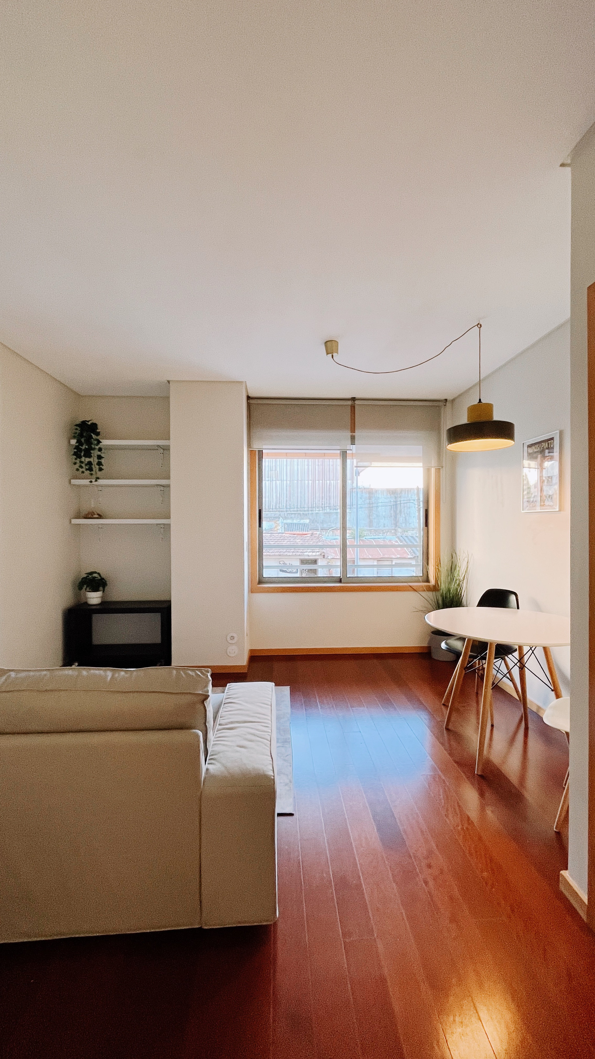 Living room with sofa and dining area