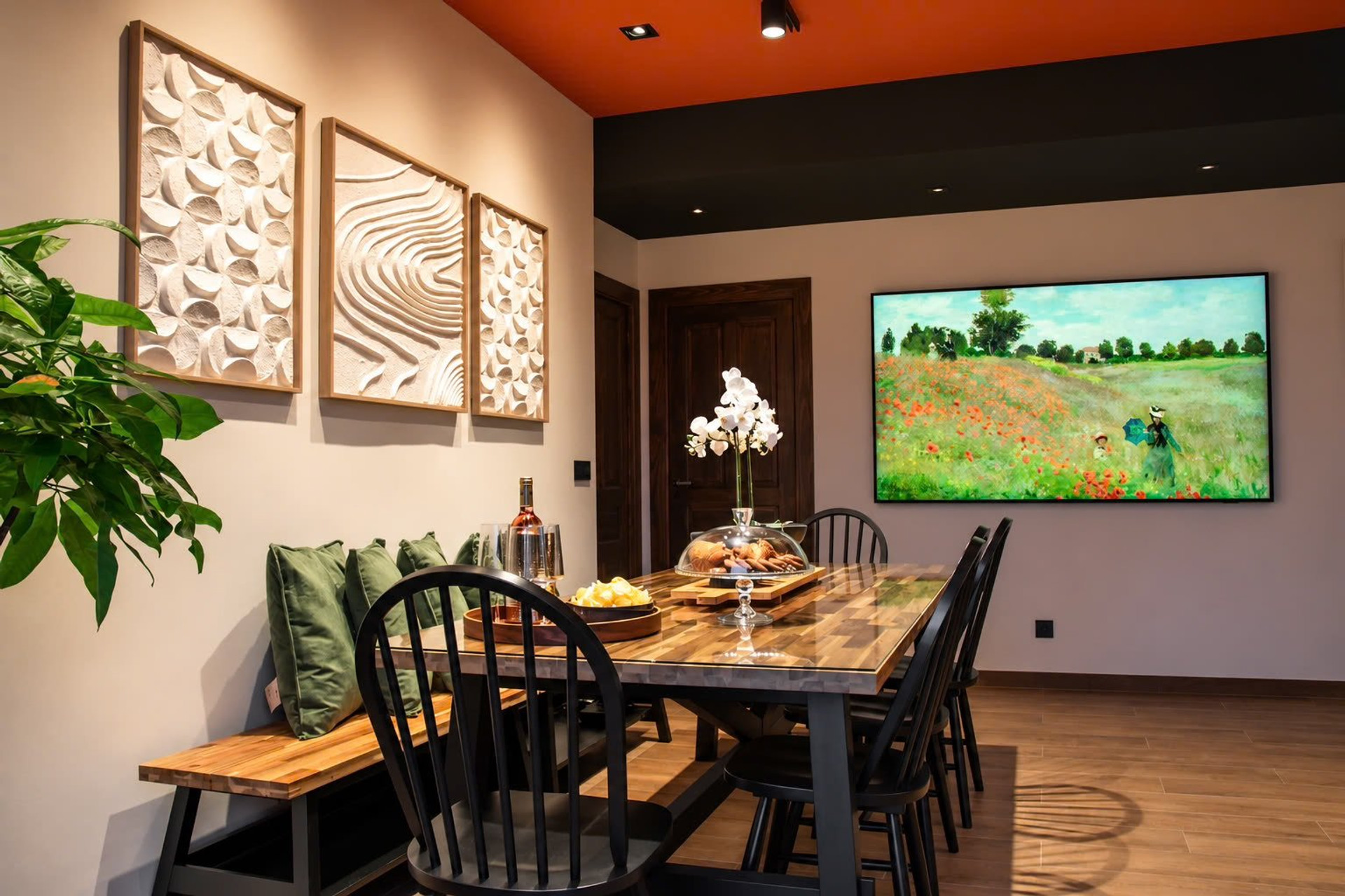 Stylish dining room with art