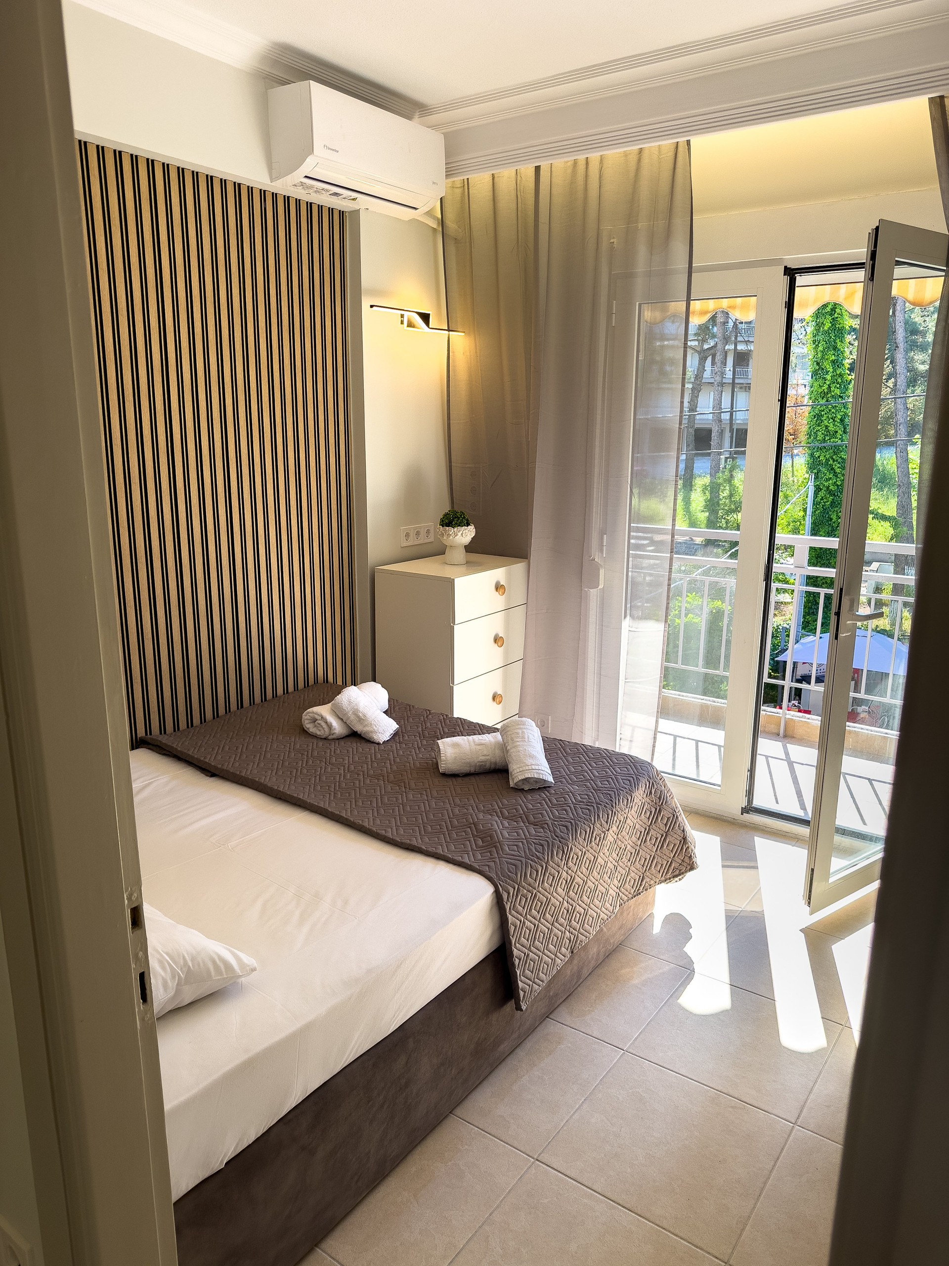 Bright bedroom with balcony access