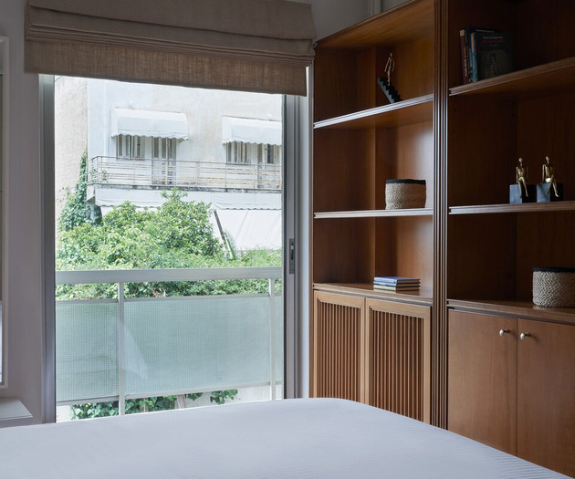The wooden library in the second bedroom