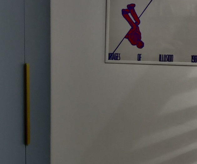 Wardrobe and wall poster