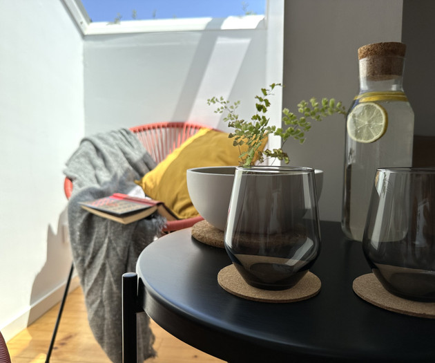 Balcony table with drinks glasses